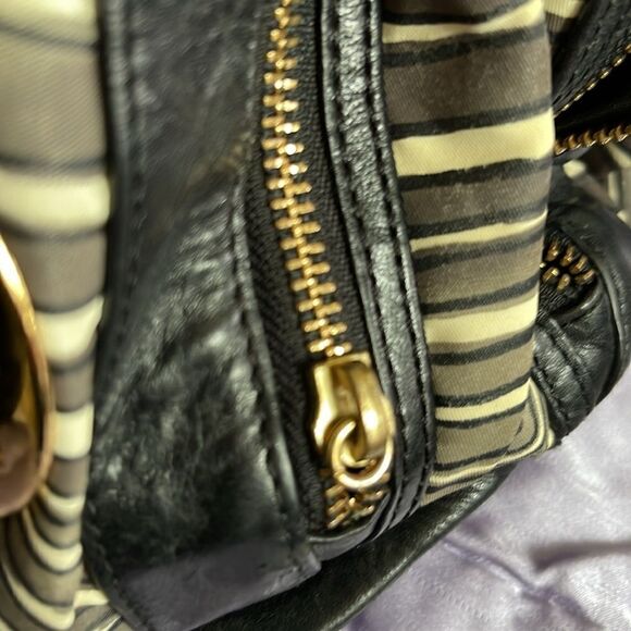 - Tory Burch Nylon Zebra prints & black leather Weekender bag with shoul… - Picture 15 of 15